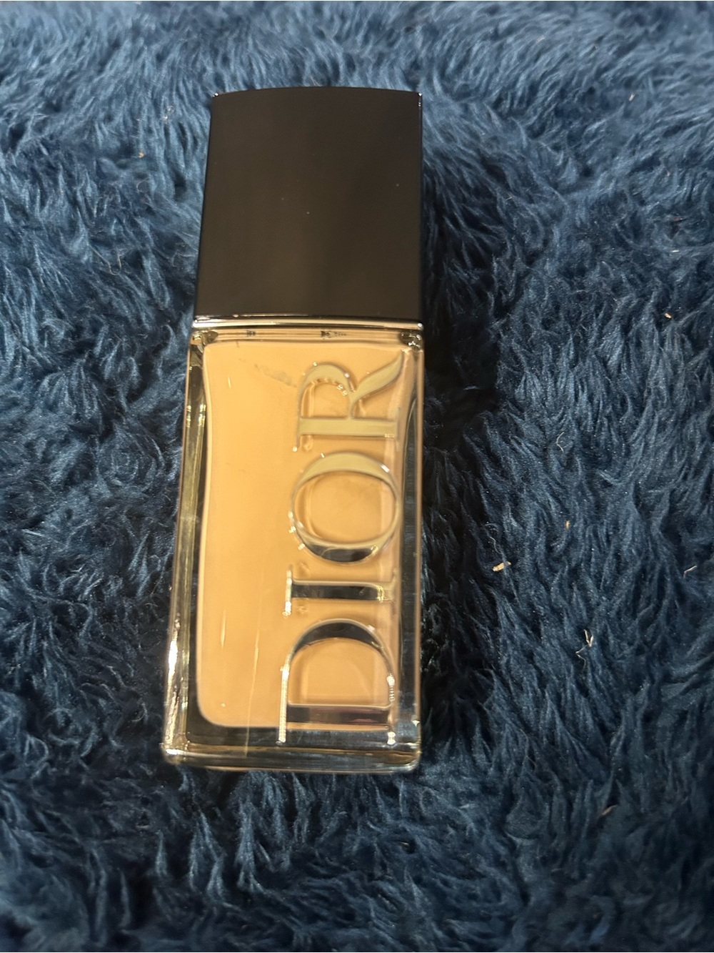 Dior Liquid Foundation in Light Beige Used once and was not my color